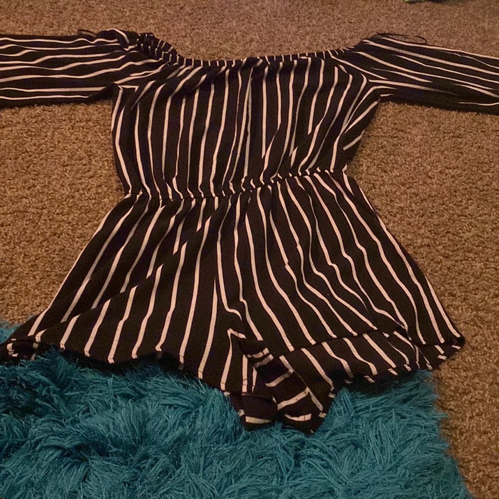 I have not wear this before it is a black n white one piece suit